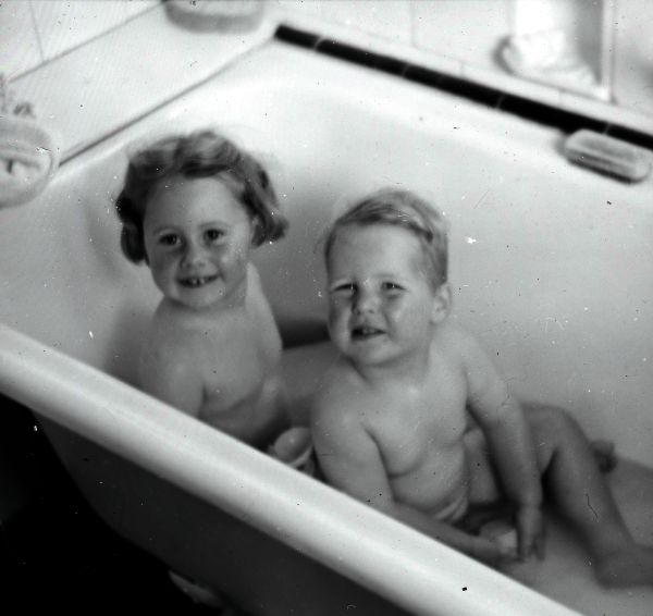 Stephen Last in the bath with Sue Evans.